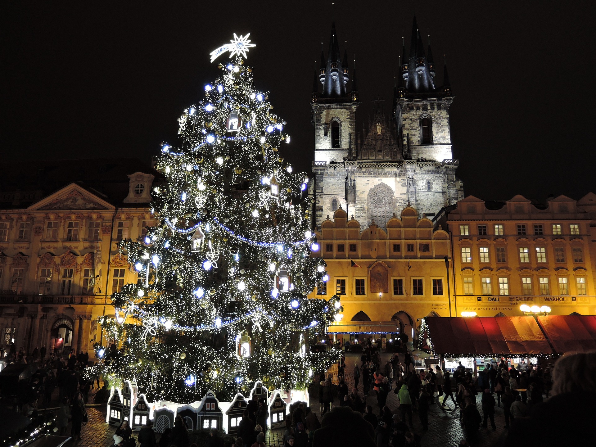 Prague Christmas Markets Bliss | Vibrant scene of Prague's Christmas market, featuring festive stalls, holiday decorations, and joyful atmosphere.