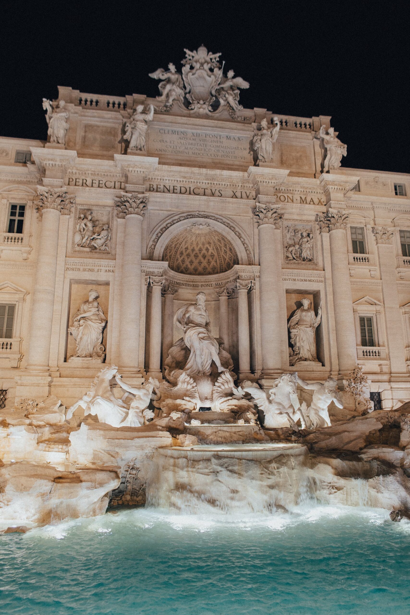 "Exterior view of a white-colored building in Rome, reflecting classical elegance and architectural beauty."