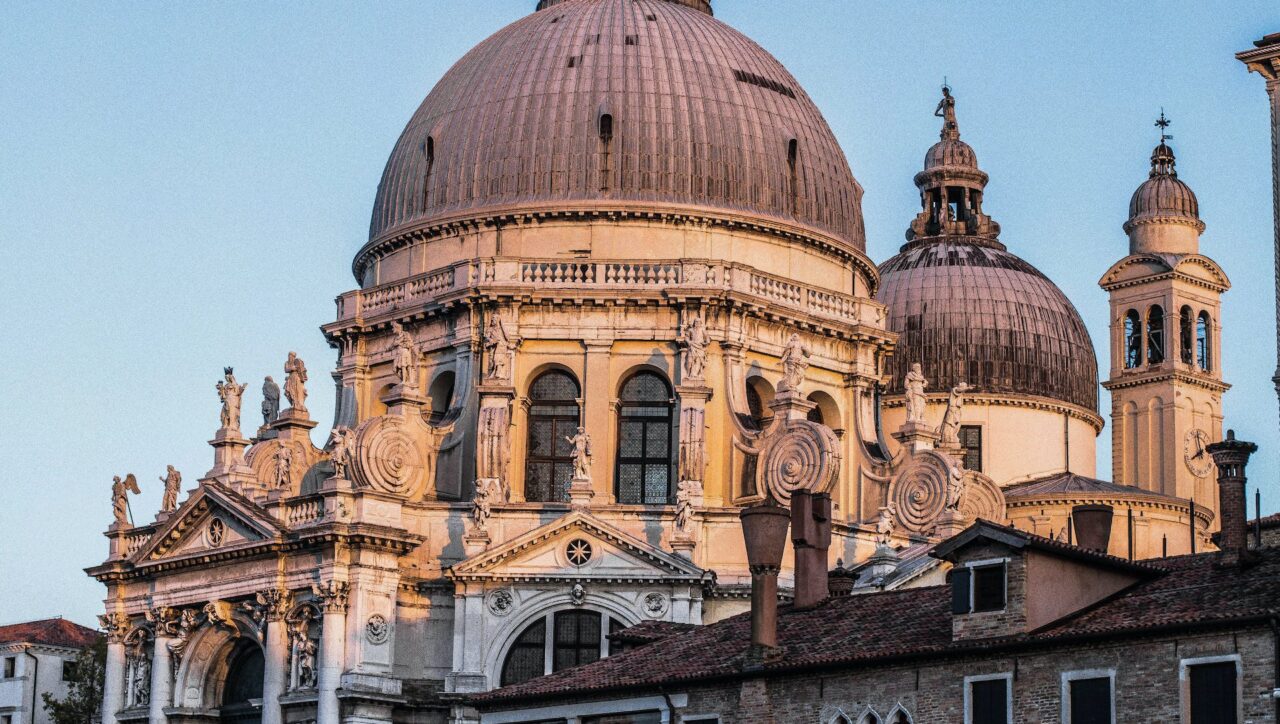 From Eternal City to Floating Beauty - Aerial view of a futuristic floating cityscape resembling Venice, with intricate waterways, gondolas, and architectural marvels, symbolizing the transformation from the Eternal City to the concept of a Floating Venice